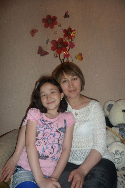 Анар Искакова