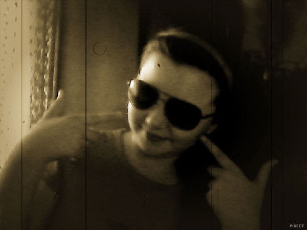 Кариша Амонова