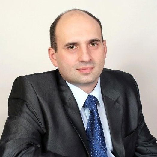 Александр Каминский