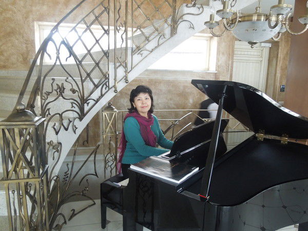 Айгуль Кантуринова