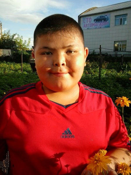 Алишер Токенов