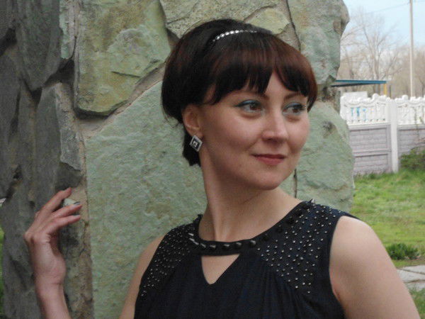 Оля Калашеева