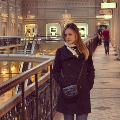 Оля Романенко