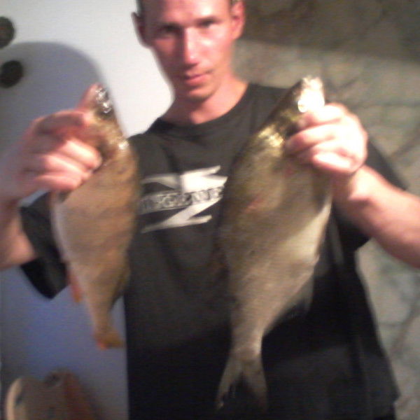 Роман Каnjukov