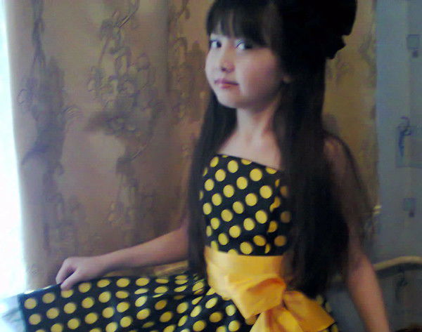 Айман Кизаева