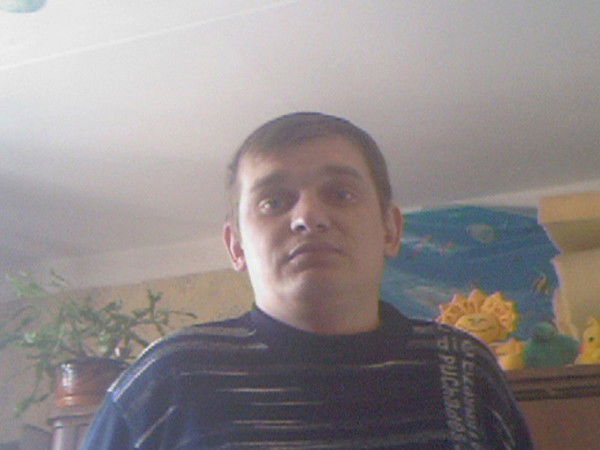 Денис Травников