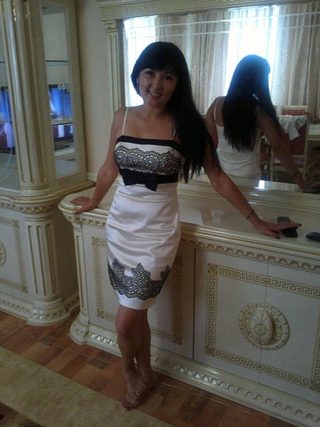 Айгуль Исинова