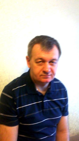 Олег Белоус