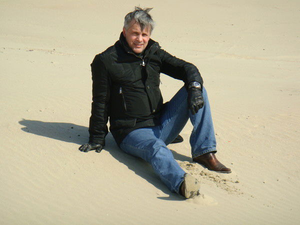 Олег Кудактин