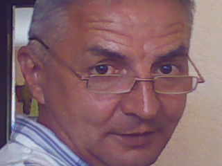 Александр Исаев