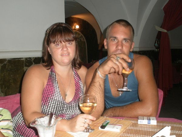 Роман Белай