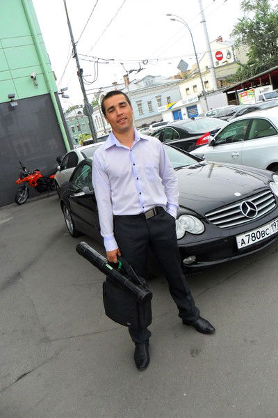 Роман Малай