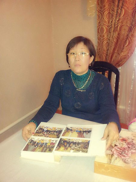 Жанат Охапова