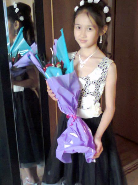 Камила Женисова