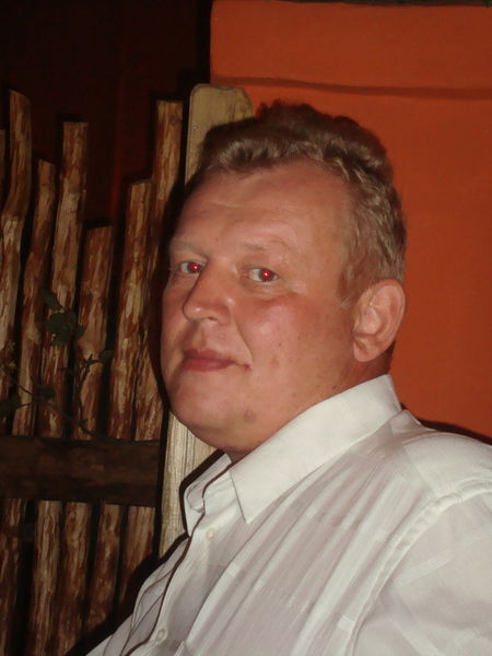 Олег Кузьмичев