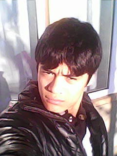 Максуд Холиков