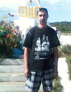 Олег Белошапка